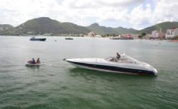 Give me a tow! Jet Ski tows large powerboat to the wharf.... by Terry Moore 